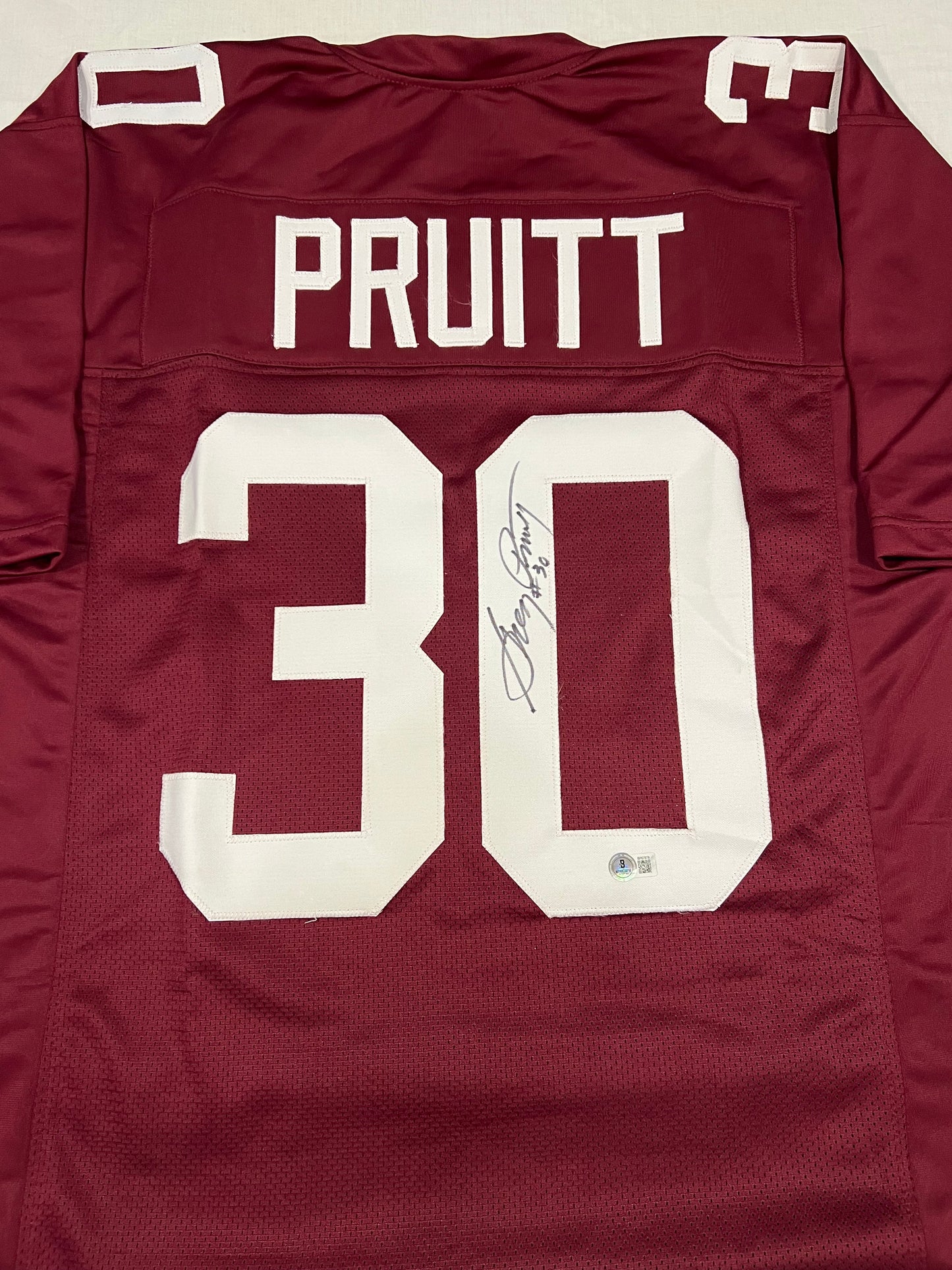 Greg Pruitt signed Brown jersey
