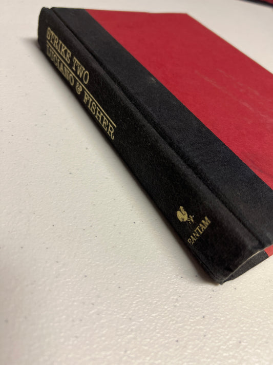 Strike Two Hardcover Book